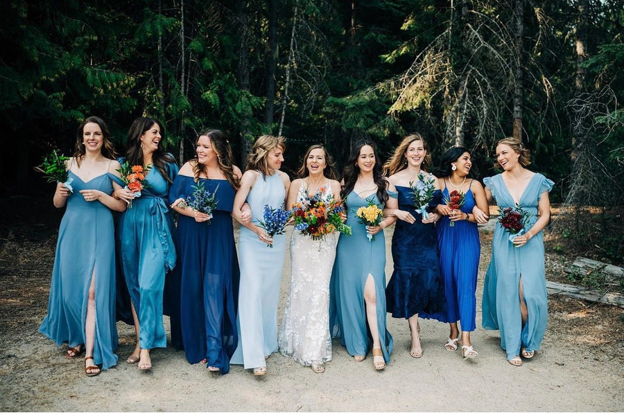 Blue themed wedding party wildflower bouquets from Daisies in May