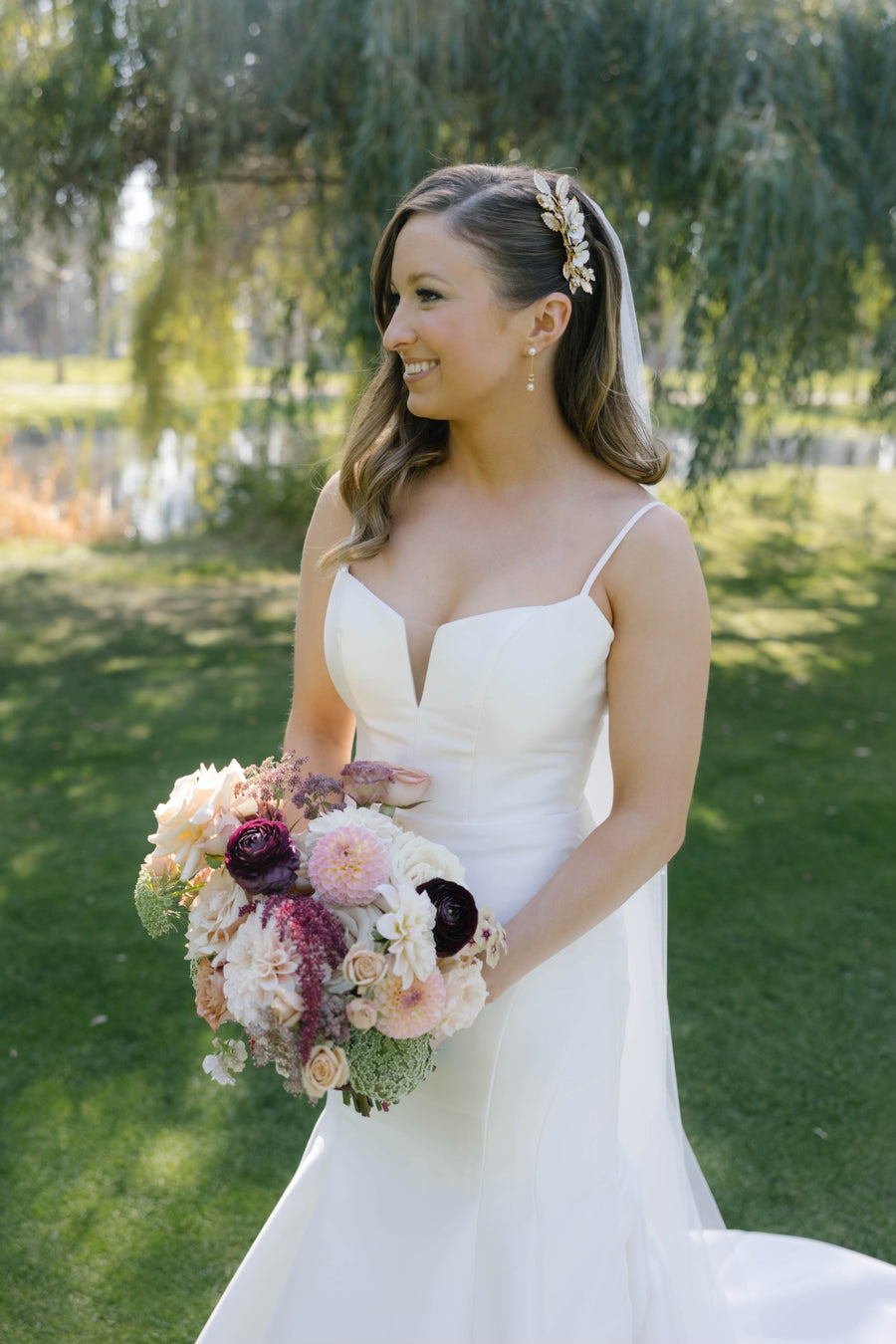 Wildflower wedding bouquet in shades of burgundy and blush flowers by Daisies in May wedding florist