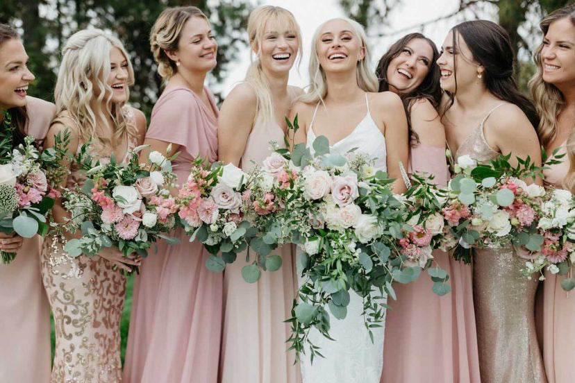 Blush, pink and white bridal and bridesmaid bouquets for a beautiful summer wedding in Spokane, Washington