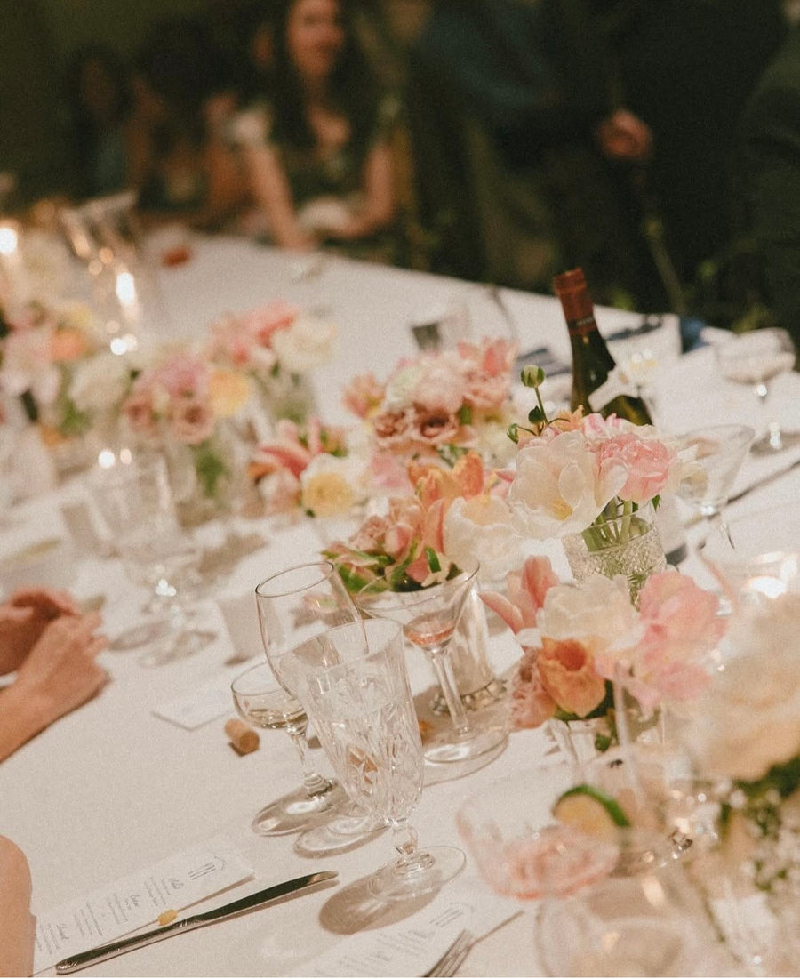 Wedding reception with white and pink flowers in Daisies in May florist
