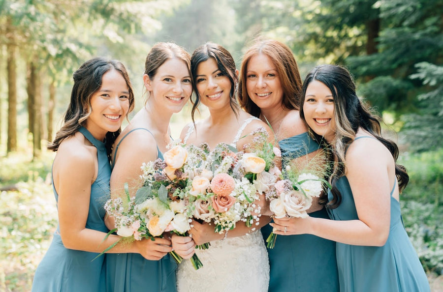 Teal, peach and cream wedding florals from Daisies in May