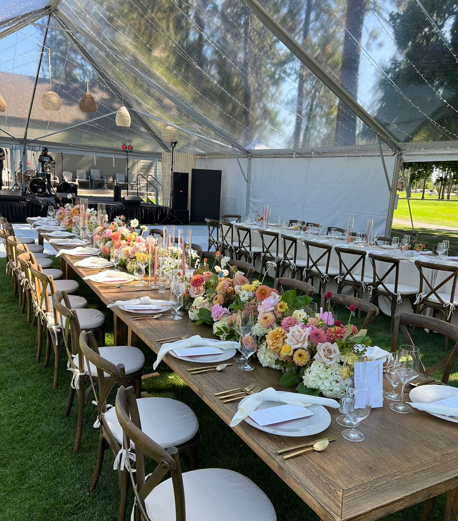 Outdoor wedding reception with beautiful flower arrangements by Daisies in May at the Manito Golf and Country Club in Spokane
