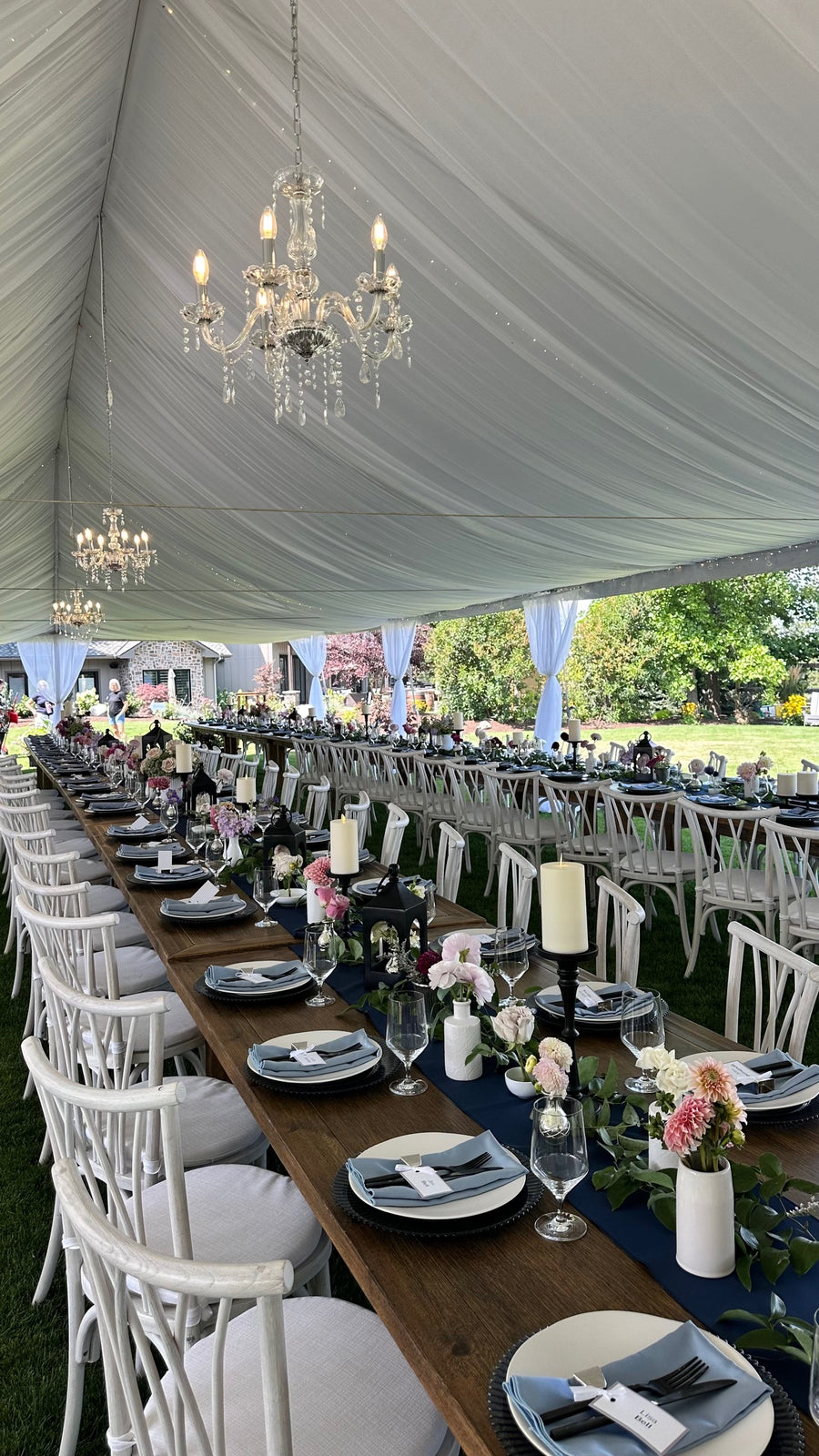 A stunning tented reception for this outdoor wedding in Spokane.