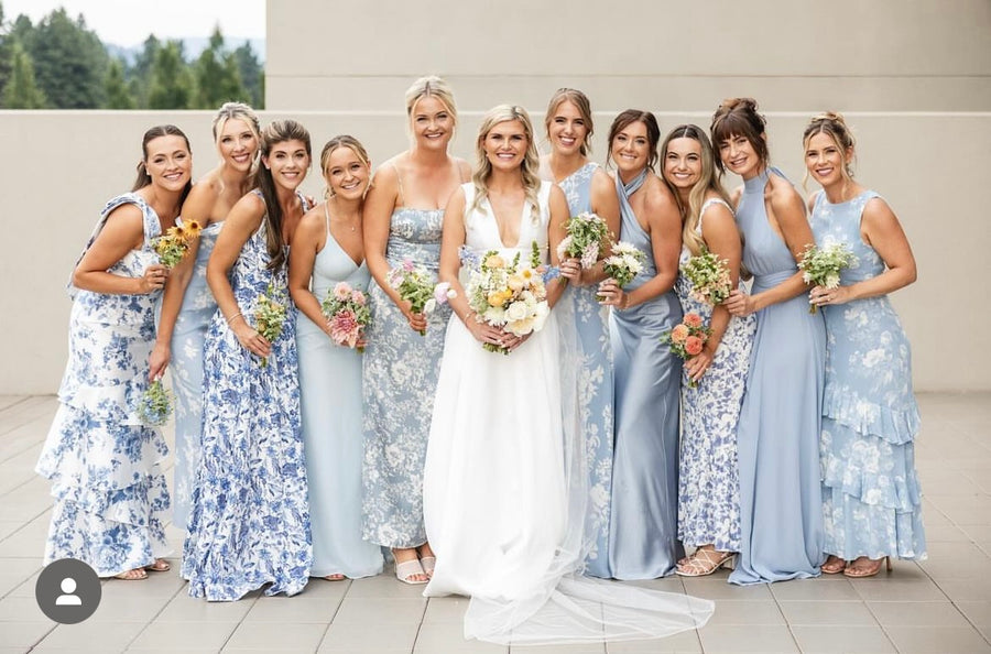 Garden party wedding at Hagadon event center in Coeur d'Alene, ID. Beautiful wildflower bouquets