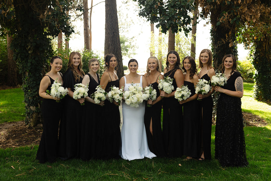 Classic white and black wedding at Arbor Crest Winery in Spokane, WA. White rose and baby breaths bouquets from Daisies in May